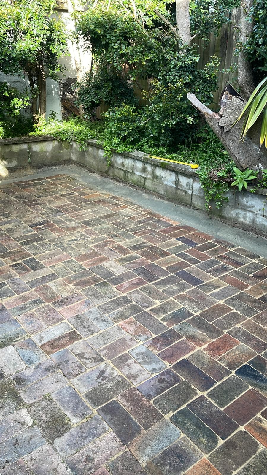 Restored paved surface after levels and drainage were corrected