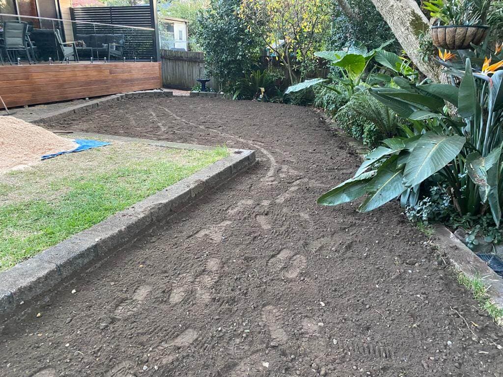 Paving base and lawn levels being prepared together