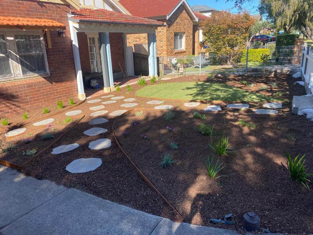 Forestville front and back yard