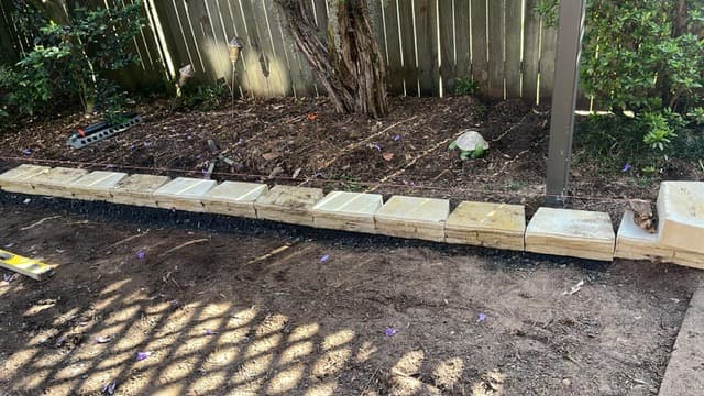 Lawn base and garden edging line being prepared