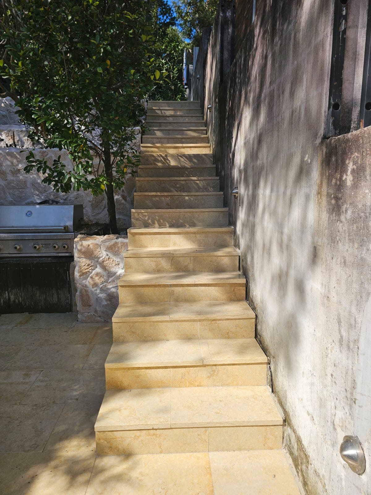 Finished replacement paving across the main steps