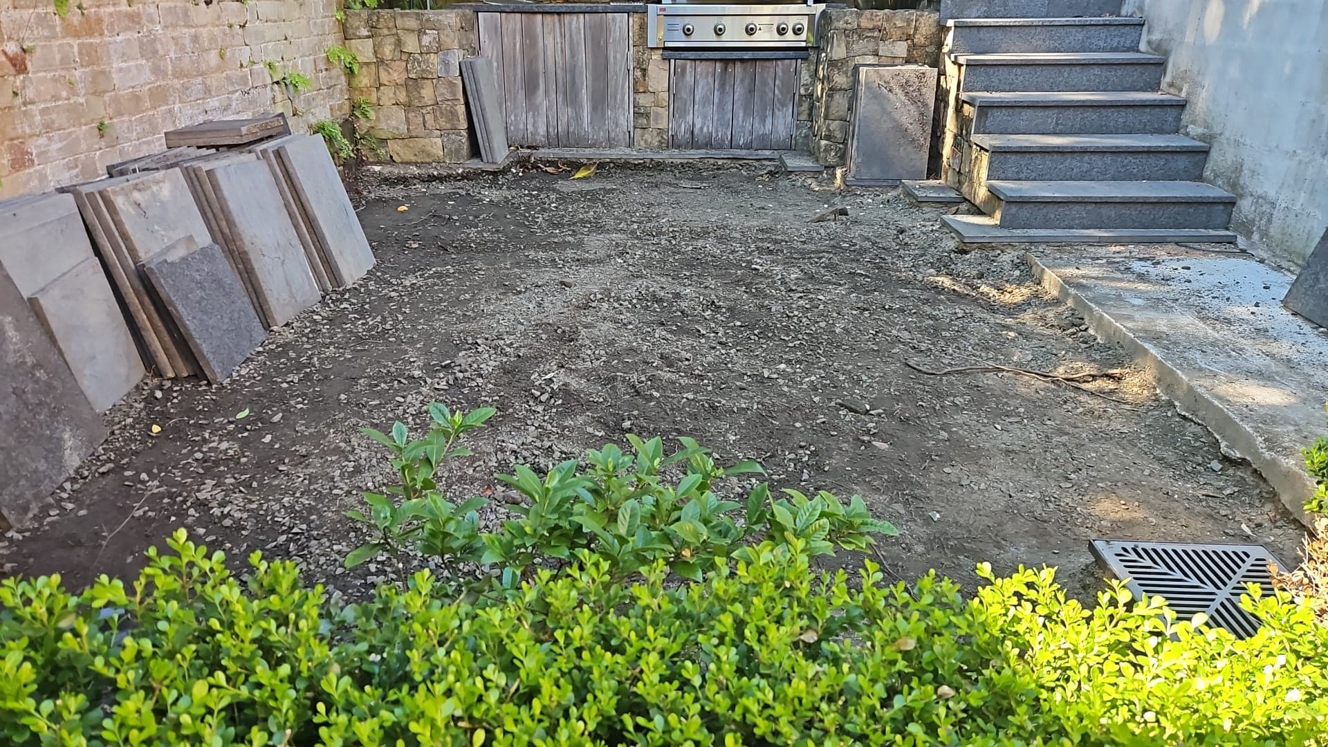 Courtyard cleared after the old pavers were removed