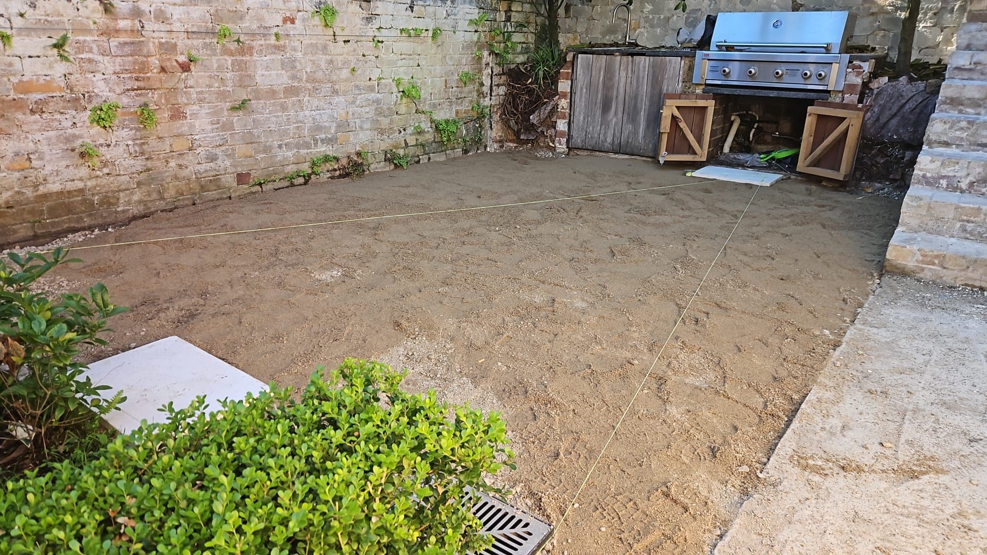 Prepared courtyard area before the replacement pavers were laid