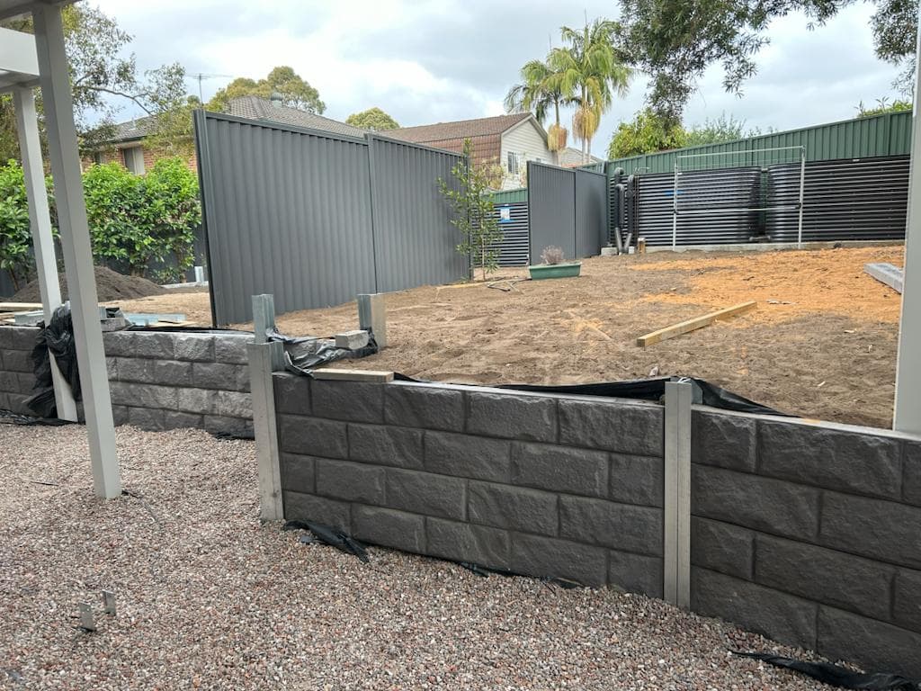 New turf and garden edging installed after level correction