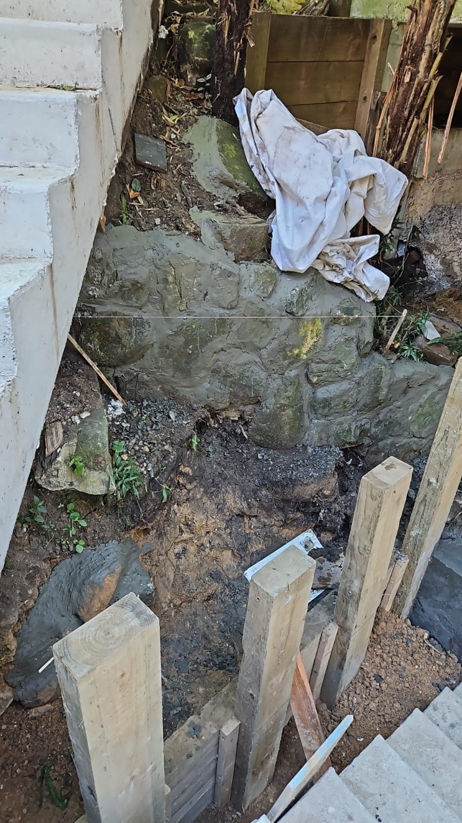 Excavation area showing the steep retained section